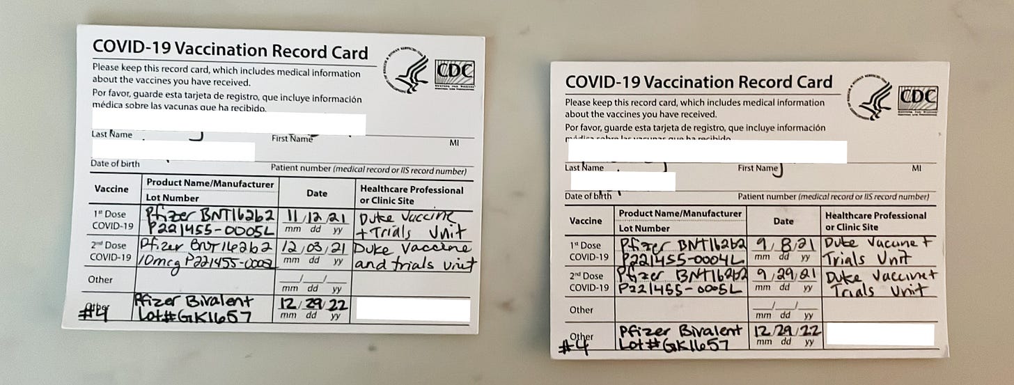 Two COVID vaccine cards with marking shows vaccines given in 2021 at Duke Vaccine Trials Unit.