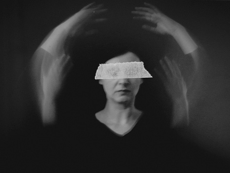 Portrait of a person in a torn up image holding dried flowers, with tape over her eyes, and with tape over her mouth.