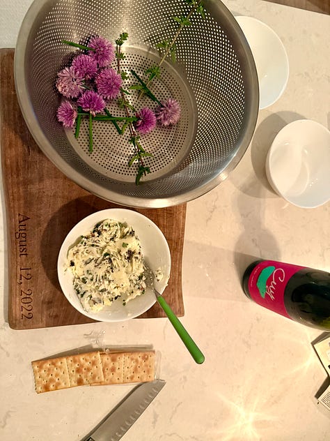 photo of garden chives and chive blossoms and homemade chive blossom and herb butter
