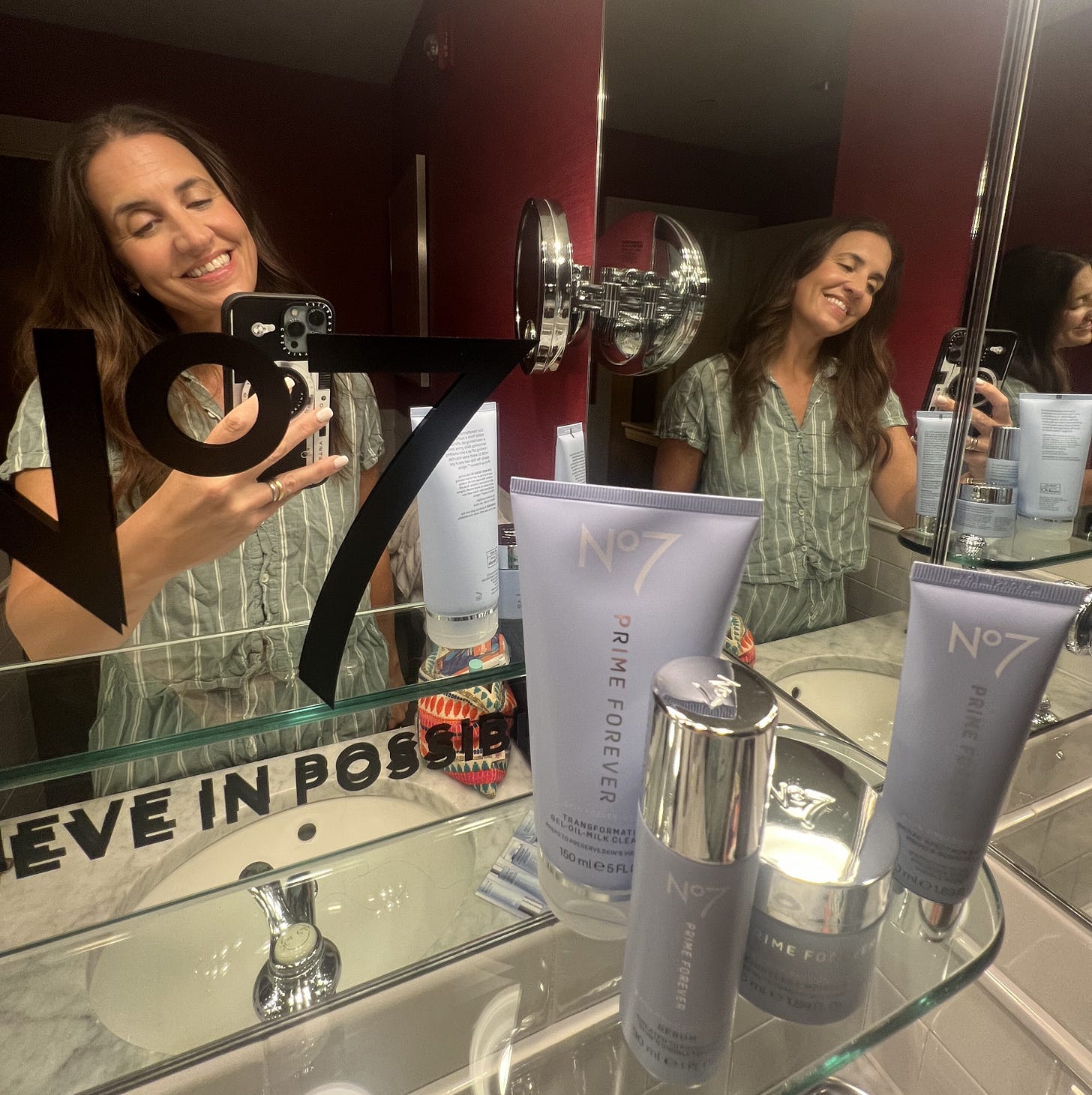 Beauty Editor Donna Francis taking a mirror selfie with No7 skincare products at The Inns of Aurora. Beauty Editor Donna Francis taking a mirror selfie with No7 skincare products at The Inns of Aurora.