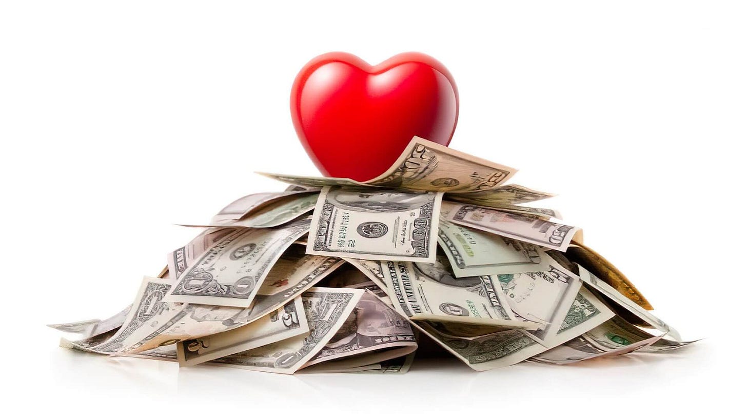 Heart standing on a stack of U.S. dollars.
