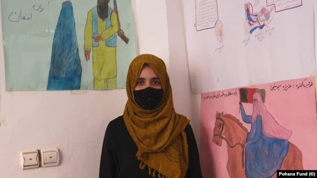 A female student attends a clandestine school in southern Afghanistan.
