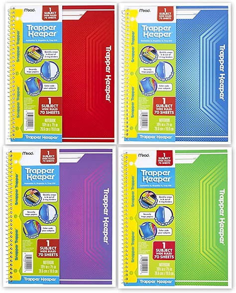 colorful 80s era trapper keeper brand binders, notebooks and folders
