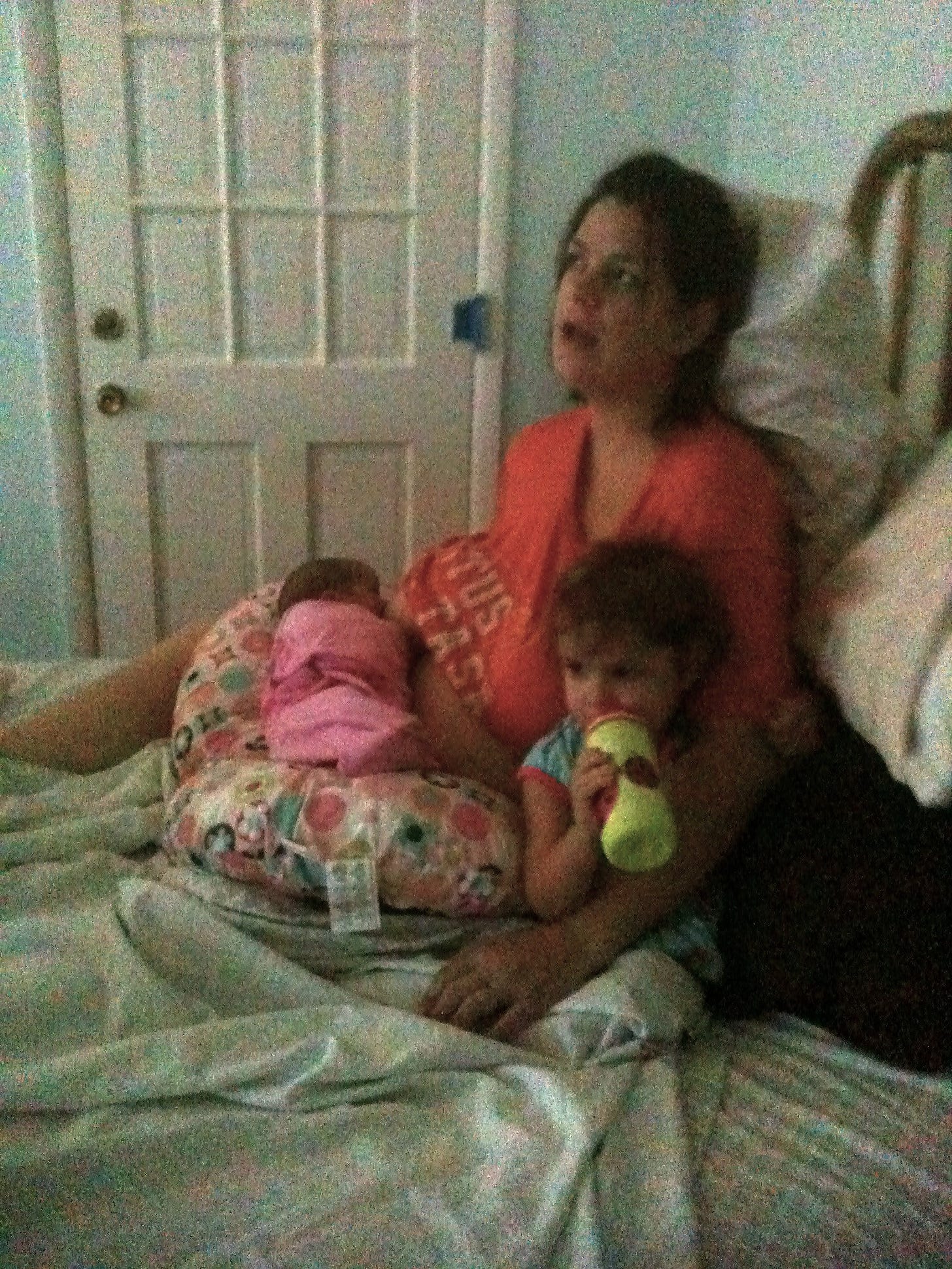 The author with her 2-year-old and newborn.