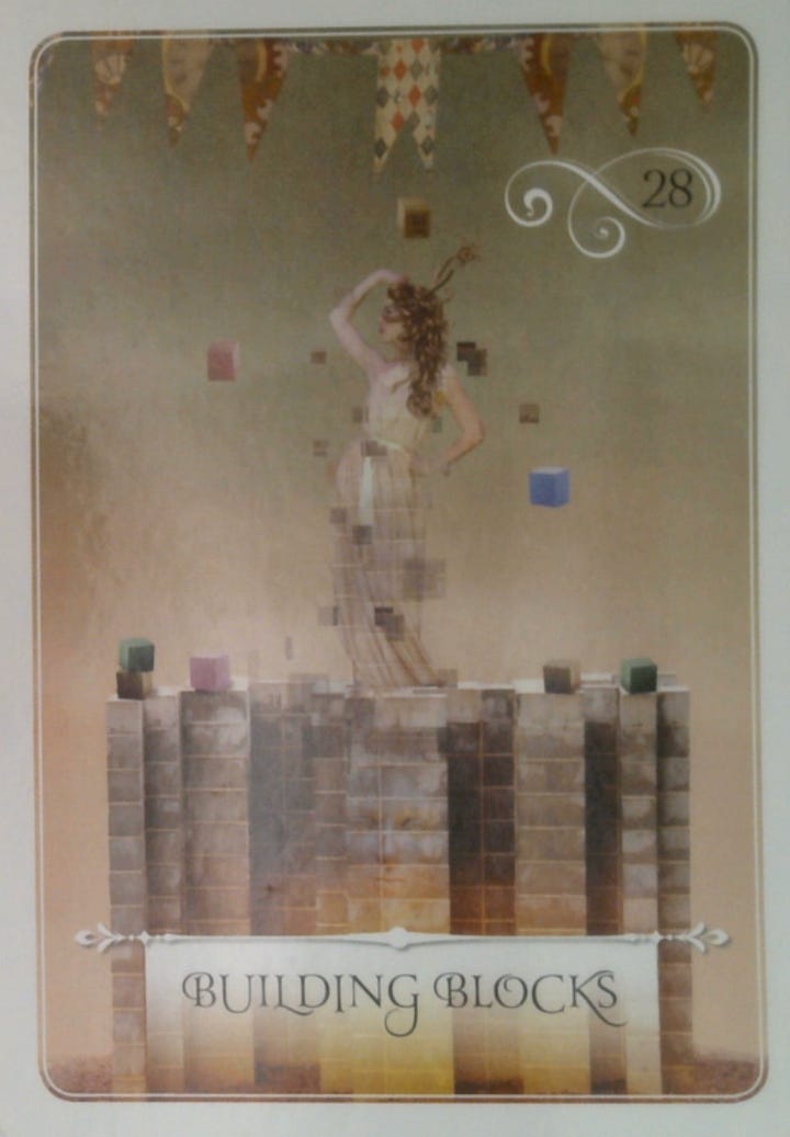 The 10 of Wands tarot card and the Building Blocks oracle card.