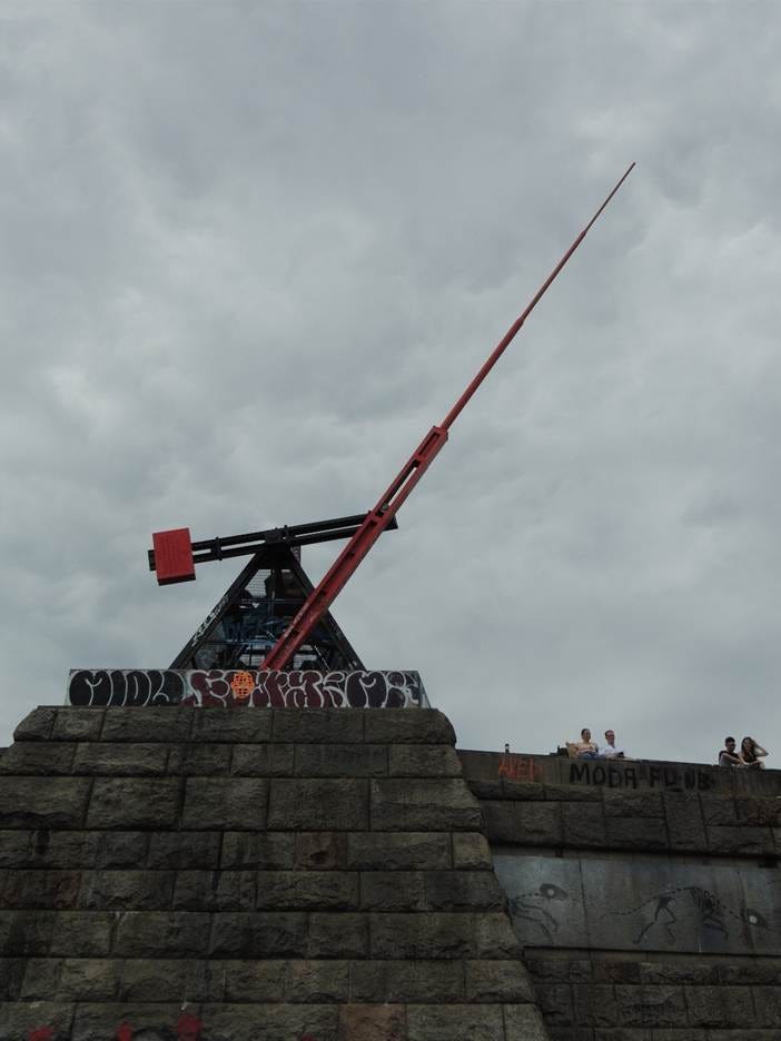 A tower with a stick on top

AI-generated content may be incorrect.