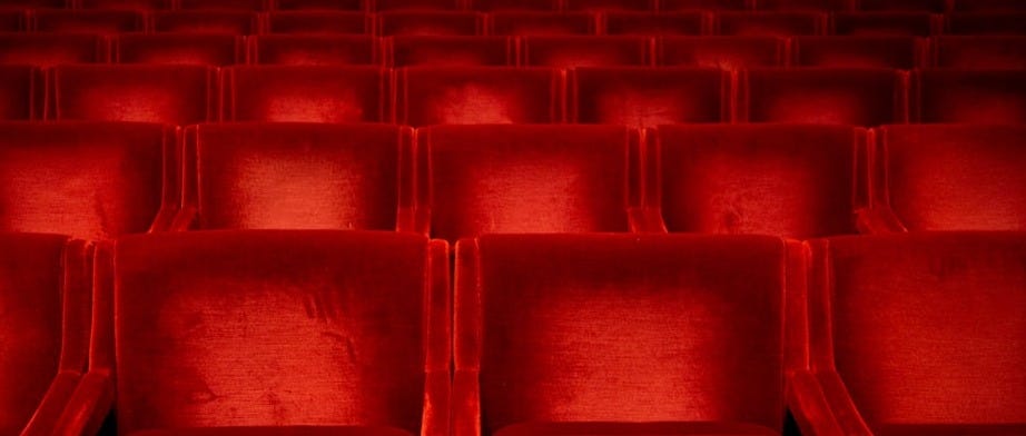 red chairs with no people red chairs with no people