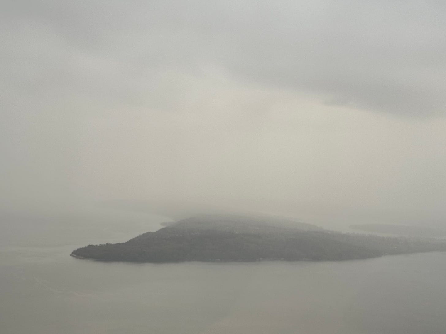 Pacific Northwest island shrouded in mist