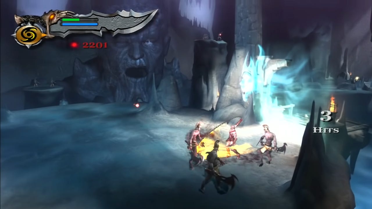 God of War II screenshot: Kratos is attacking nearby enemies with a blade attached to a chain in each hand, while a large face in the distance begins to blow air at him.