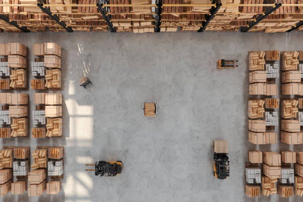 High Angle View Of Warehouse With Forklift, Pallet, AGV And Cardboard Boxes High Angle View Of Warehouse With Forklift, Pallet, AGV And Cardboard Boxes big retail store image stock pictures, royalty-free photos & images