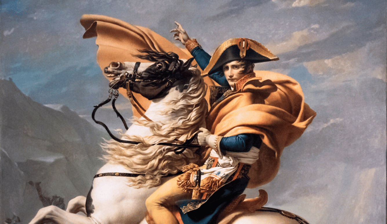 Napoleon in blue and gold uniform on a rearing white horse, draped in an orange cloak against a mountain backdrop.