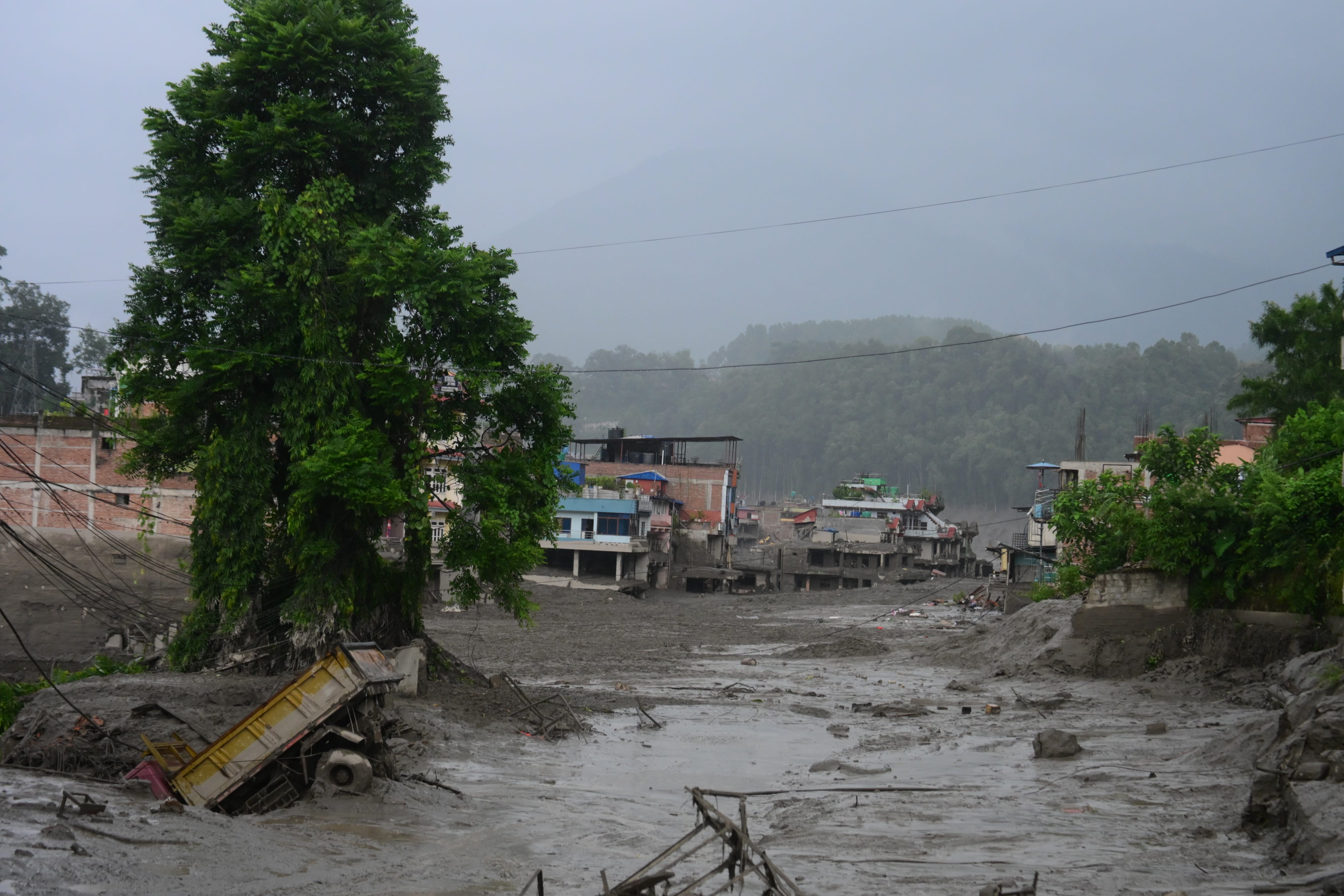Meta settles social media addiction suit; Canada strikes back in U.S. trade war; at least 95 killed in Nepal flash flood