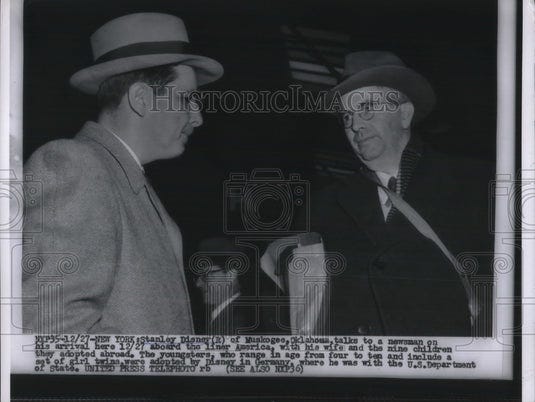 1955 Press Photo Stanley Disney Arriving to US with 9 Adopted German Children- Historic Images 1955 Press Photo Stanley Disney Arriving to US with 9 Adopted German Children- Historic Images