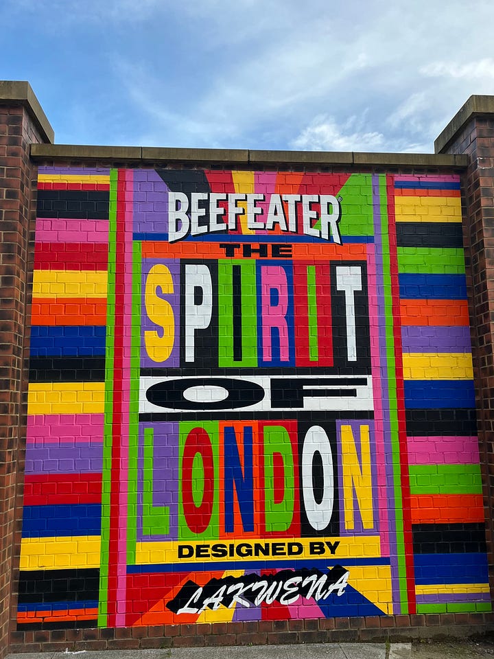 first photo sculpture of rhino & dog playing chess by Gillie and Marc. second photo of brightly colourful Beefeater mural