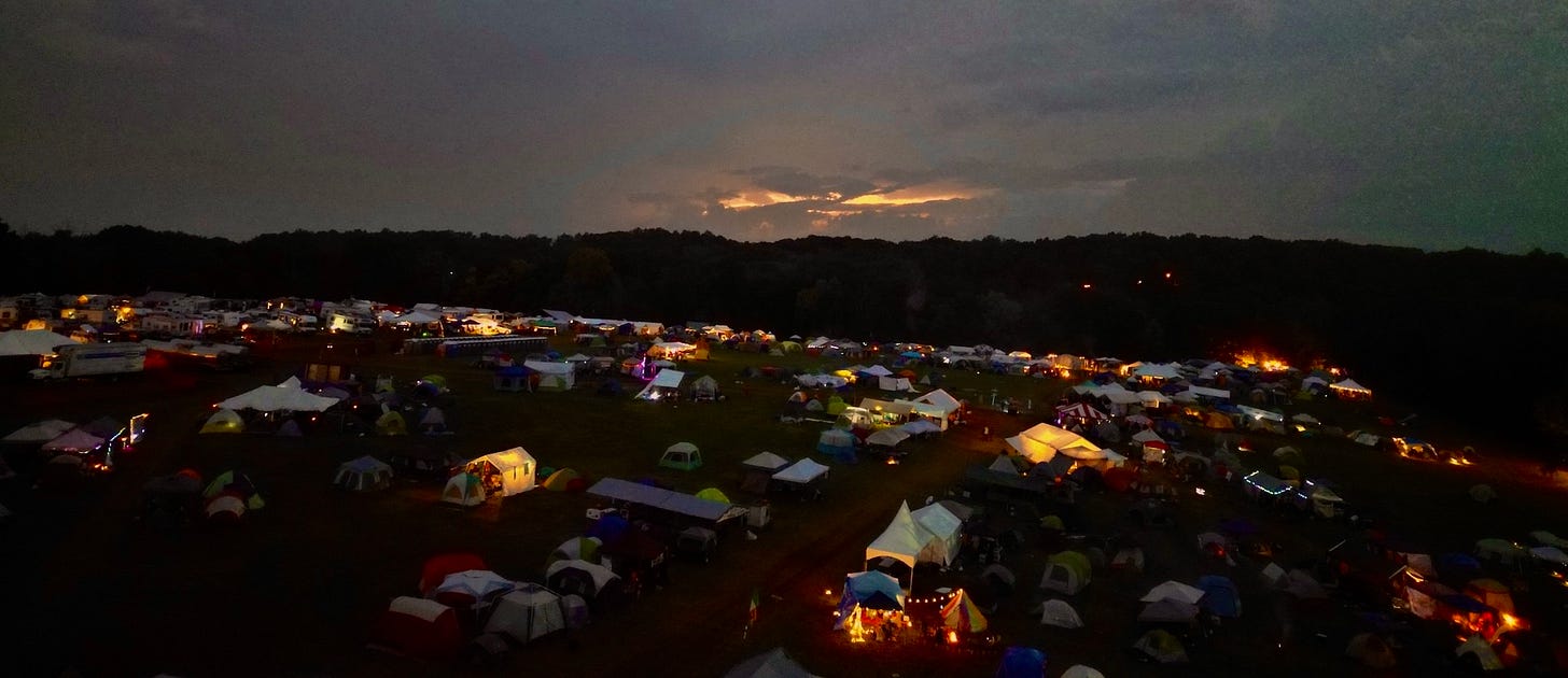 The sun setting after a storm during the final night of the festival / photo taken by author on DJI Mini 3 Pro Drone The sun setting after a storm during the final night of the festival / photo taken by author on DJI Mini 3 Pro Drone