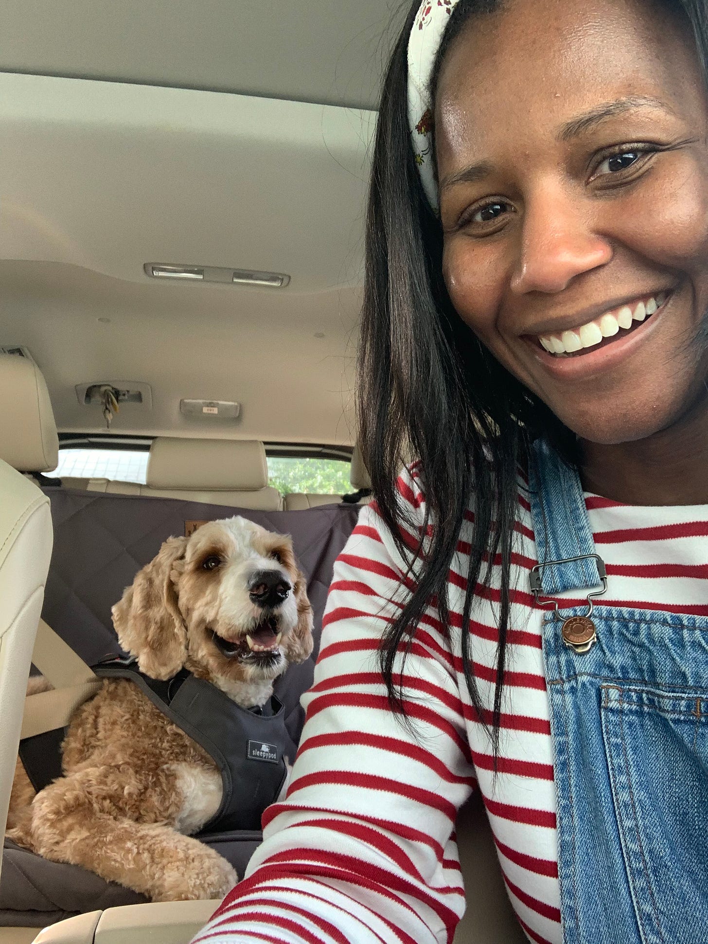 Lisette drives Lucy in the car