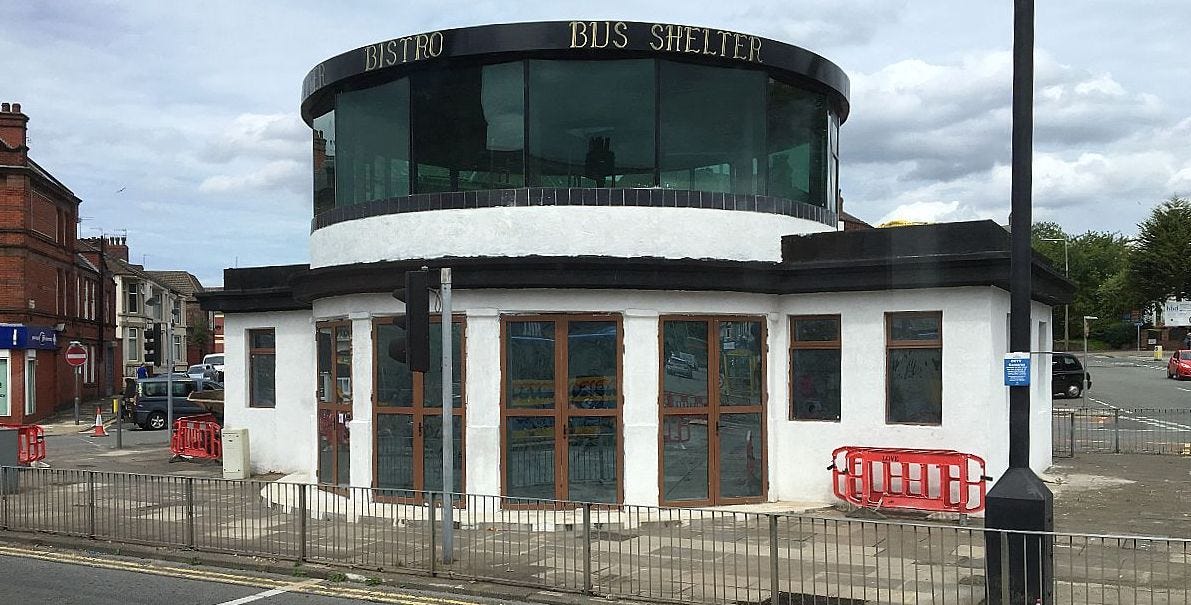 The shelter in the middle of a roundabout in Penny lane The shelter in the middle of a roundabout in Penny lane
