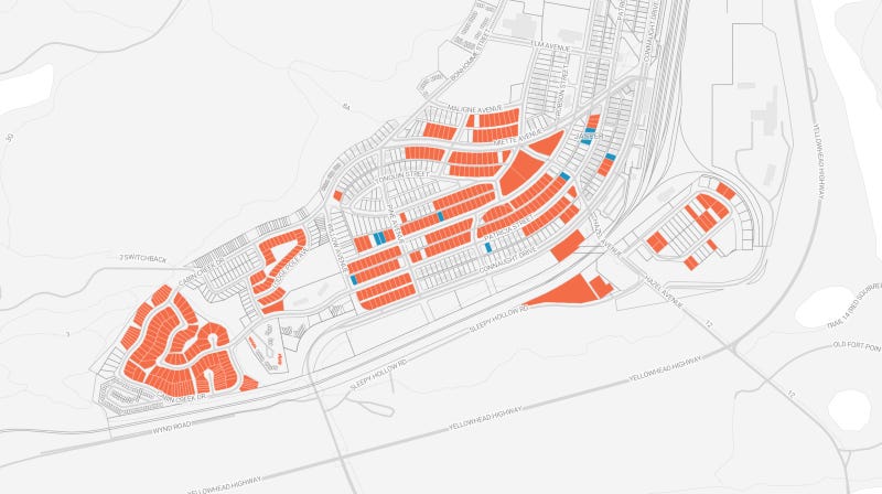 a town map with large swaths of properties colored in red to show what had burned a town map with large swaths of properties colored in red to show what had burned