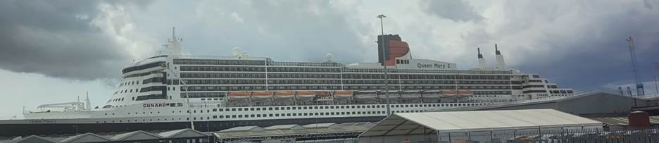 A large cruise ship in a port

AI-generated content may be incorrect.