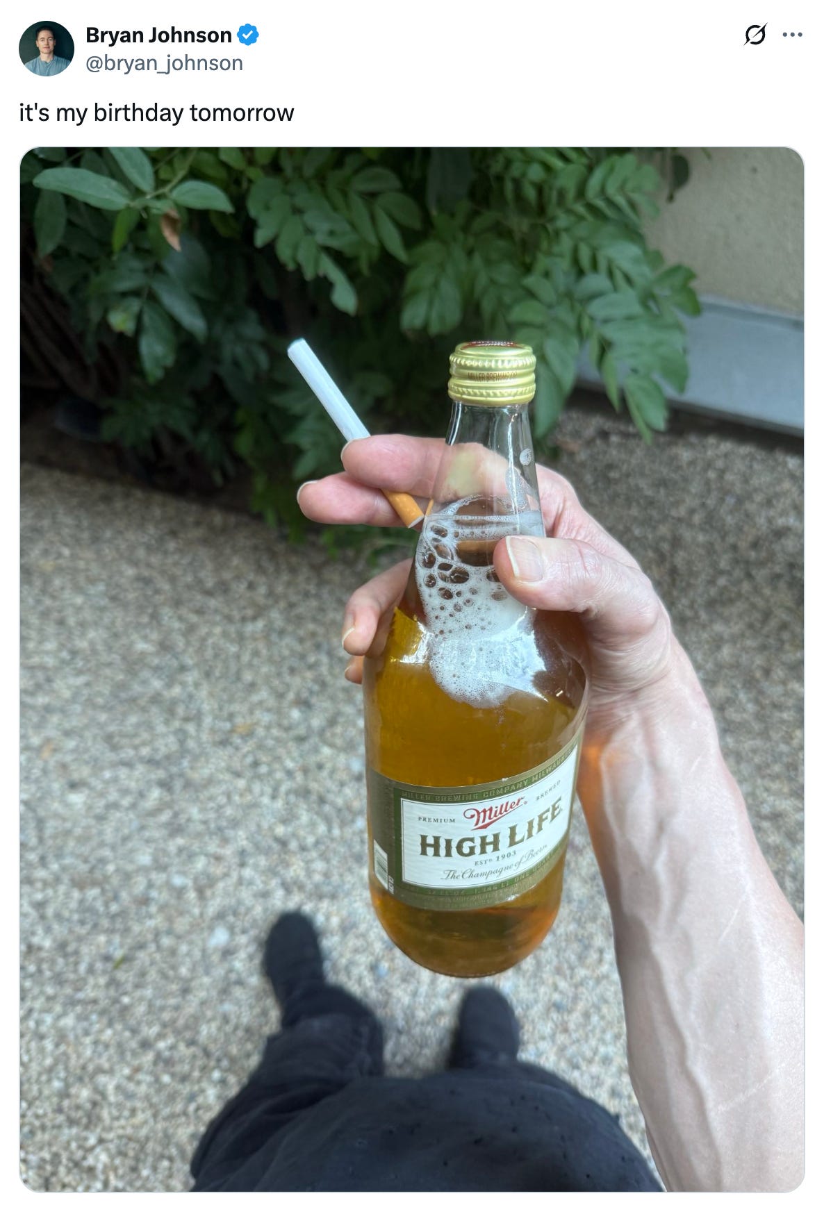 Tweet from Bryan Johnson that says "it's my birthday tomorrow" and features a hand holding a beer and a cigarette