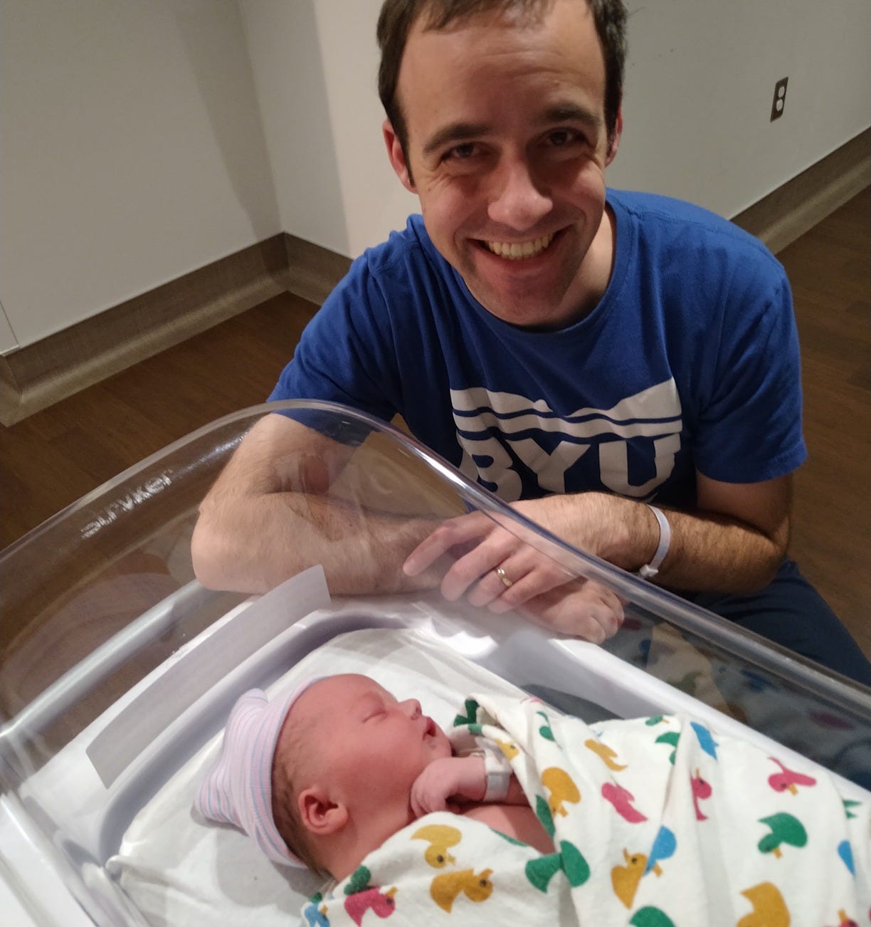 May be an image of 2 people, baby and hospital