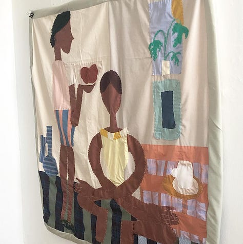 An assortment of textile art and patchwork dresses made by Sarah Nsikak.