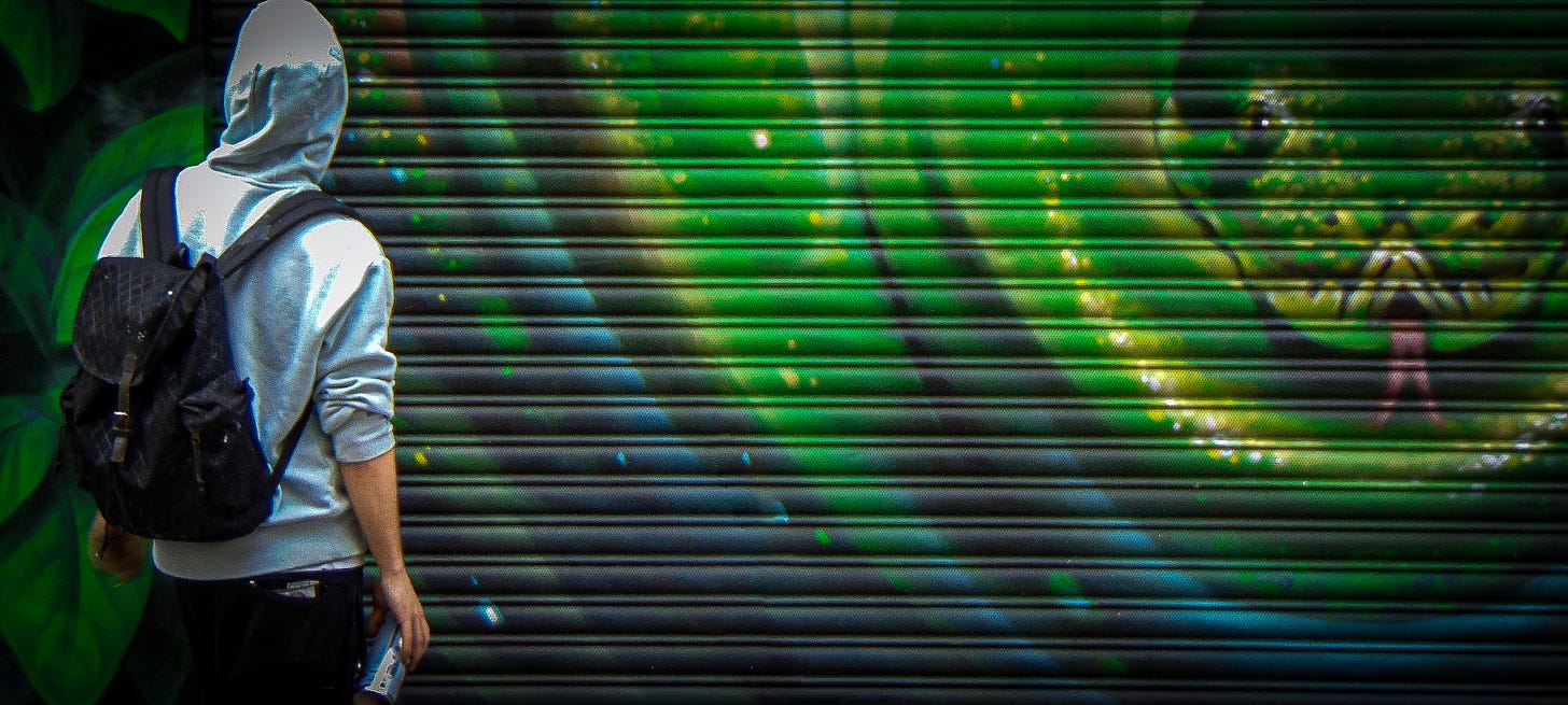 (A graffiti artist painting a serpent.) The serpent, what does it symbolize -- to you, to the artist, to me (the photographer), to the observer passing on the street in Dublin? (A graffiti artist painting a serpent.) The serpent, what does it symbolize -- to you, to the artist, to me (the photographer), to the observer passing on the street in Dublin?