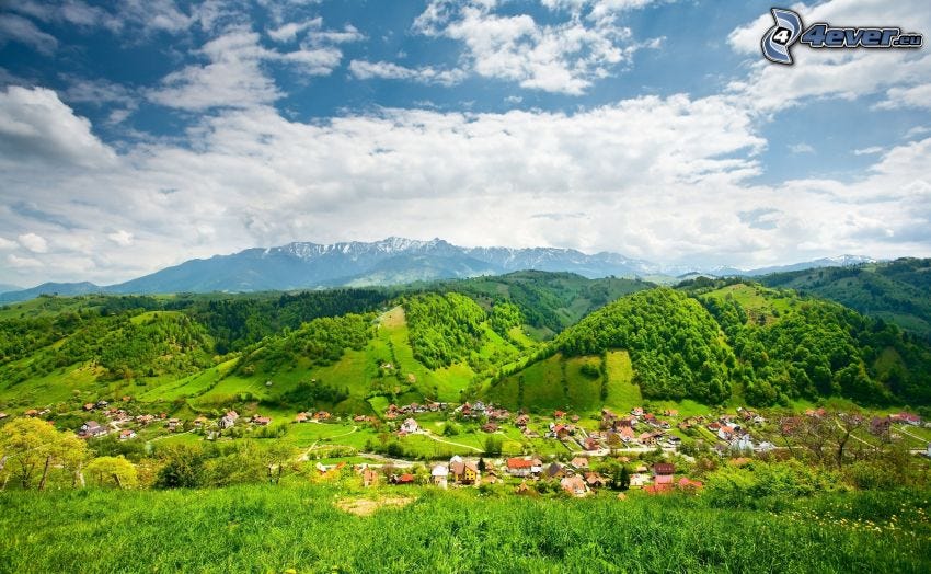 village in the valley, mountains, clouds