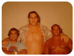 Andre the Giant is flanked by Omar and Cyclone Negro Andre the Giant is flanked by Omar and Cyclone Negro