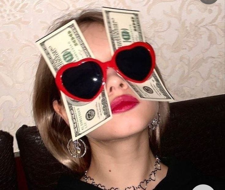 This may contain: a woman wearing heart shaped sunglasses with money sticking out of her eyes in front of her face
