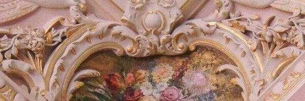 This may contain: an ornate painting on the side of a building