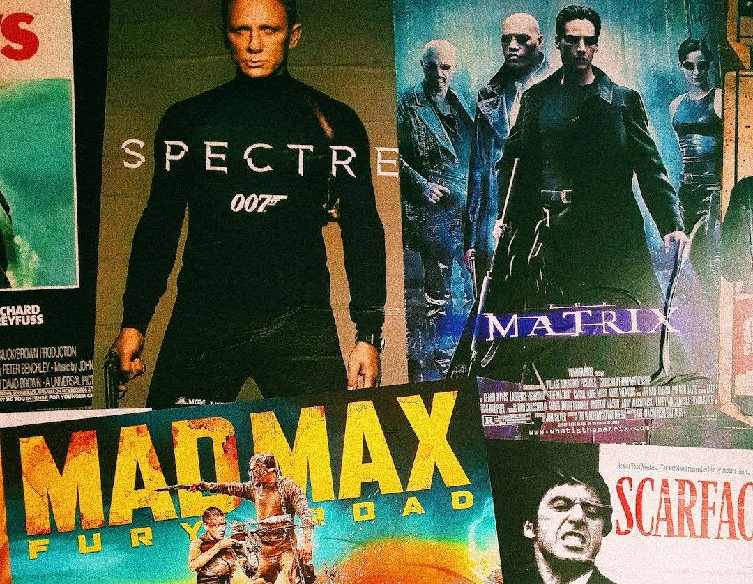 DVDs of various movies, including Spectre and The Matrix.