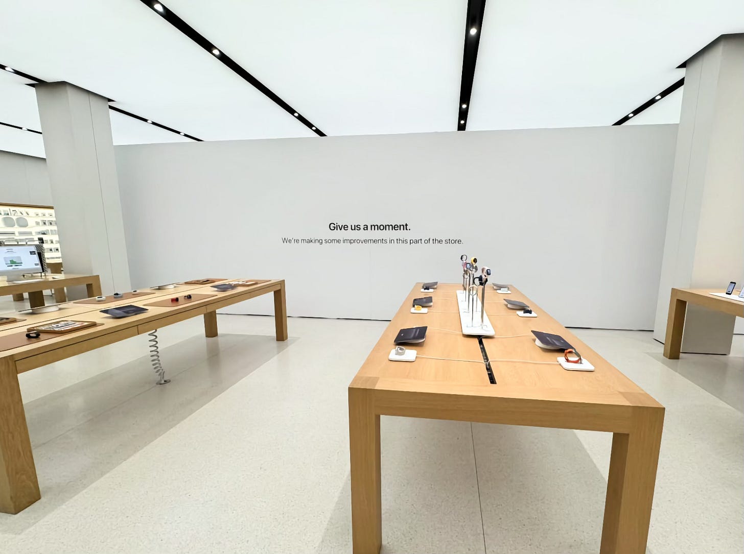 A large white barricade surrounds the Forum at Apple Park Meadows. A large white barricade surrounds the Forum at Apple Park Meadows.