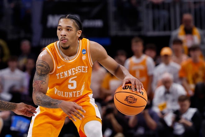 Mar 31, 2024; Detroit, MI, USA; Tennessee Volunteers guard Zakai Zeigler (5) dribbles the ball in the first half against the Purdue Boilermakers during the NCAA Tournament Midwest Regional at Little Caesars Arena. Mandatory Credit: Rick Osentoski-USA TODAY Sports