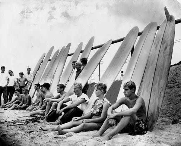 Six young women with their surfboards on a Southern California beach, circa late 1920s/early 1930s. Six young women with their surfboards on a Southern California beach, circa late 1920s/early 1930s.