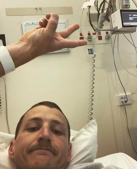 May be an image of 2 people, people standing, hospital and indoor