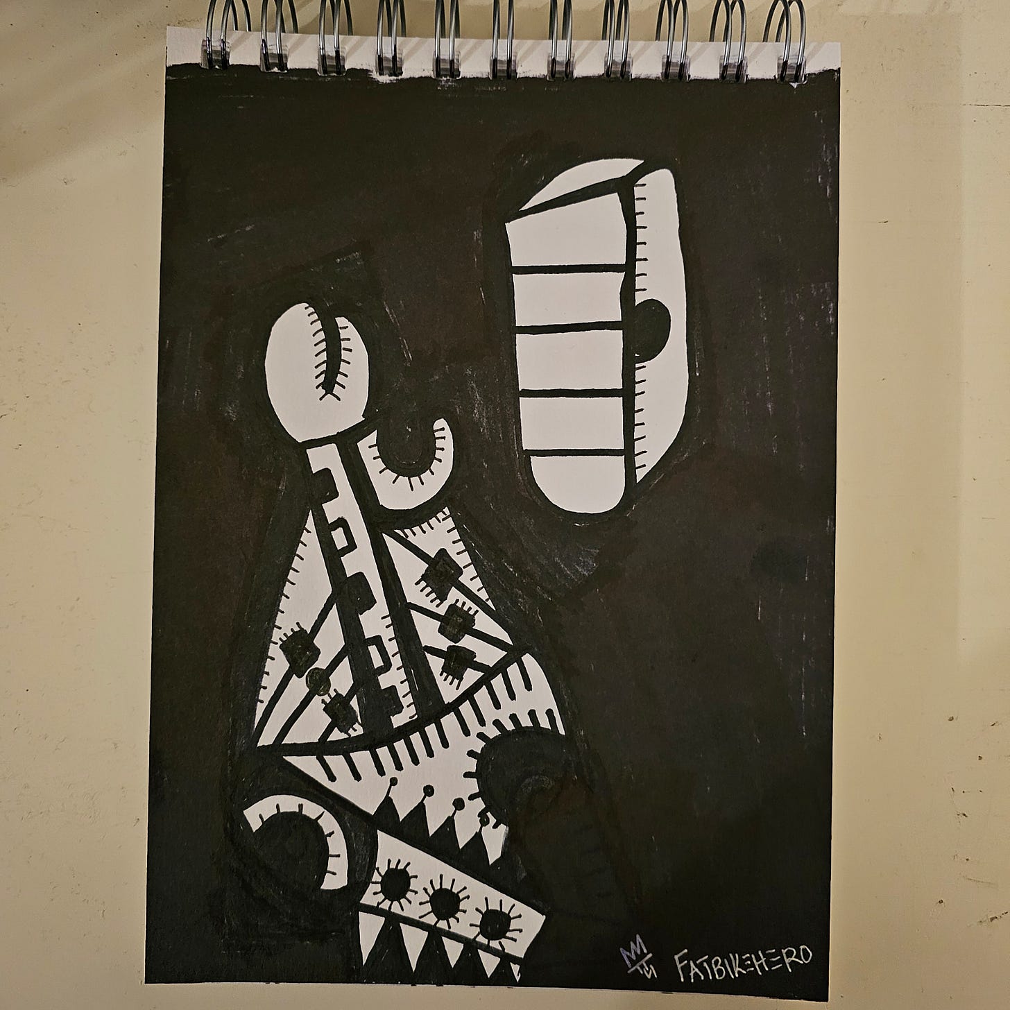 A high-contrast black and white ink drawing in a neo-tribal or abstract style. To the left is a jagged, complex figure resembling a stylized torso or mechanism with saw-tooth patterns. To the right floats a segmented, rectangular object resembling a refrigerator or a boxing glove. The background is heavy black ink.
