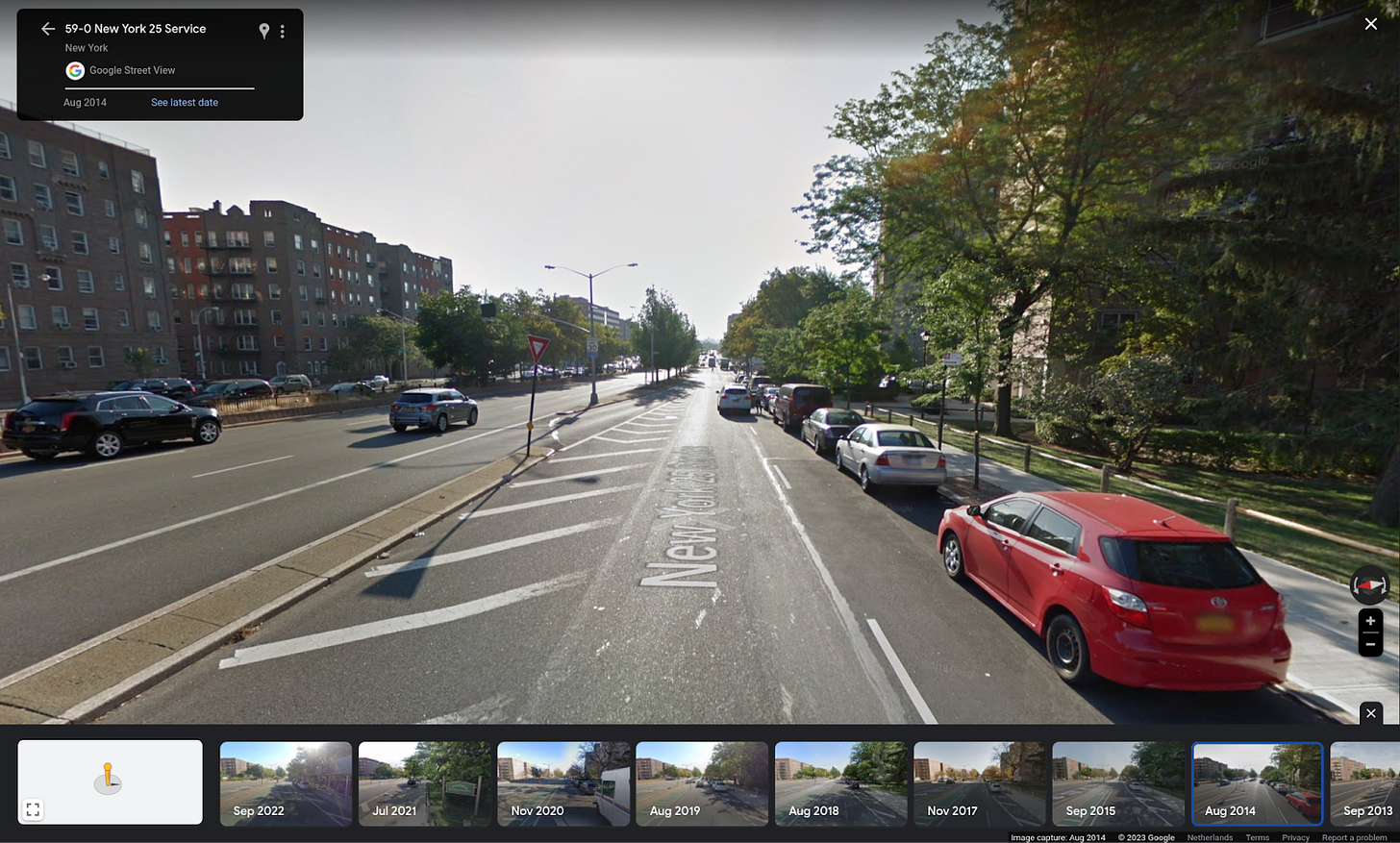 Image shows a highway offramp style access from the main road into the service road.