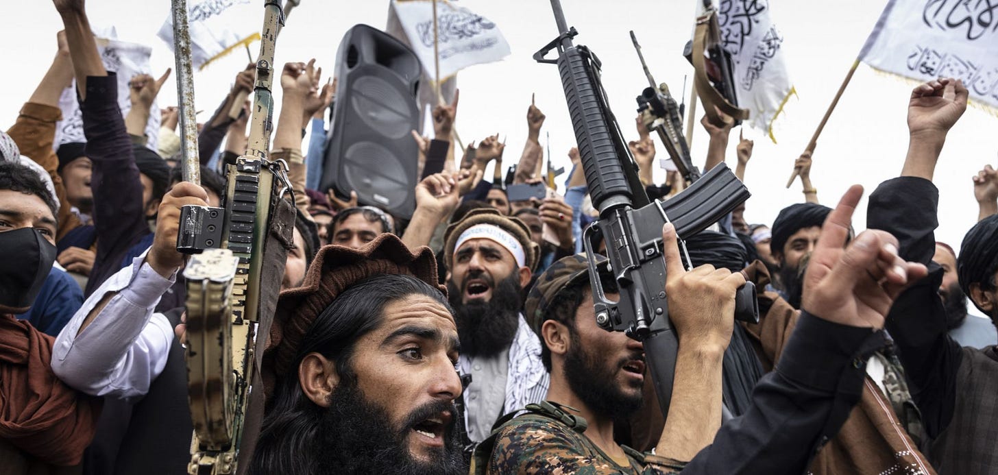 Taliban fighters take to the streets during a national holiday celebrating the first anniversary of the group’s takeover on Aug. 15, 2022, in Kabul, Afghanistan. Taliban fighters take to the streets during a national holiday celebrating the first anniversary of the group’s takeover on Aug. 15, 2022, in Kabul, Afghanistan.