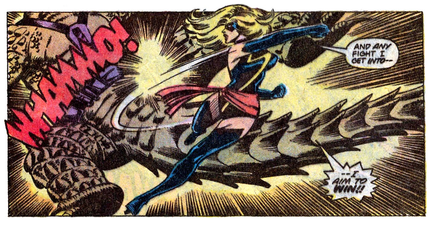 A panel from this issue showing Ms. Marvel punching a lizard person. Ms. Marvel says, “And any fight I get into — I aim to win!!” Sound effect for the punch is “Whammo!”