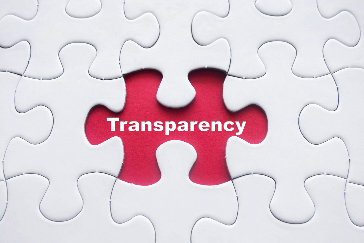 puzzle with missing piece. where piece should be is the word "transparency"