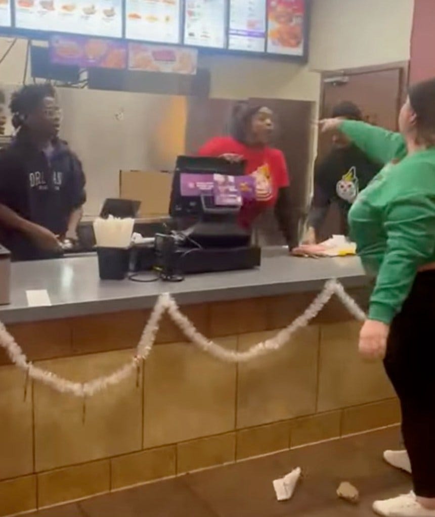 The woman hurled insults and objects at the Jack in the Box workers