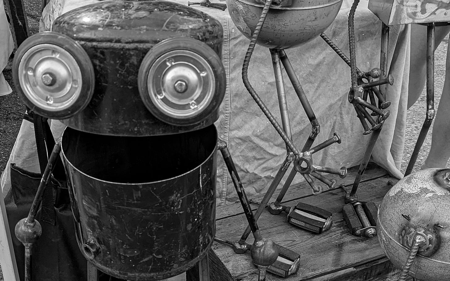 Robots crafted from discarded metal parts Robots crafted from discarded metal parts