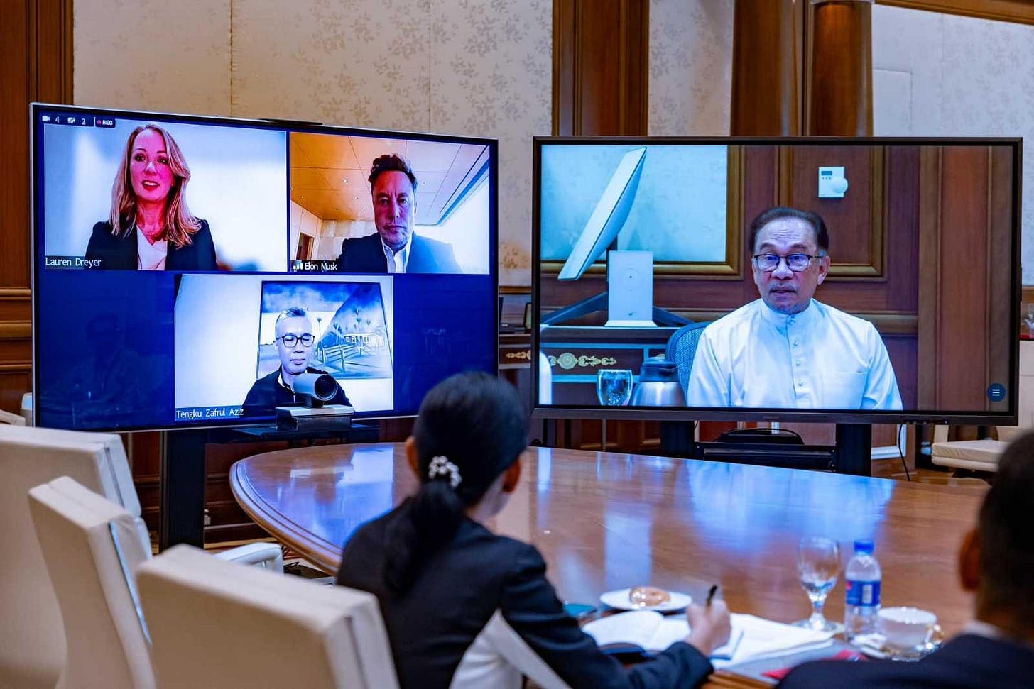 Prime Minister Anwar Ibrahim attends a video conference with billionaire entrepreuner Elon Musk. Photo: Facebook 
