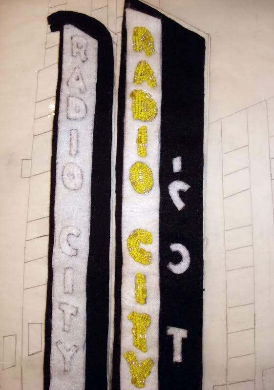 beaded radio city music hall painting beadwork mixed media art NYC taxi cab street scene theatre marquee beaded radio city music hall painting beadwork mixed media art NYC taxi cab street scene theatre marquee
