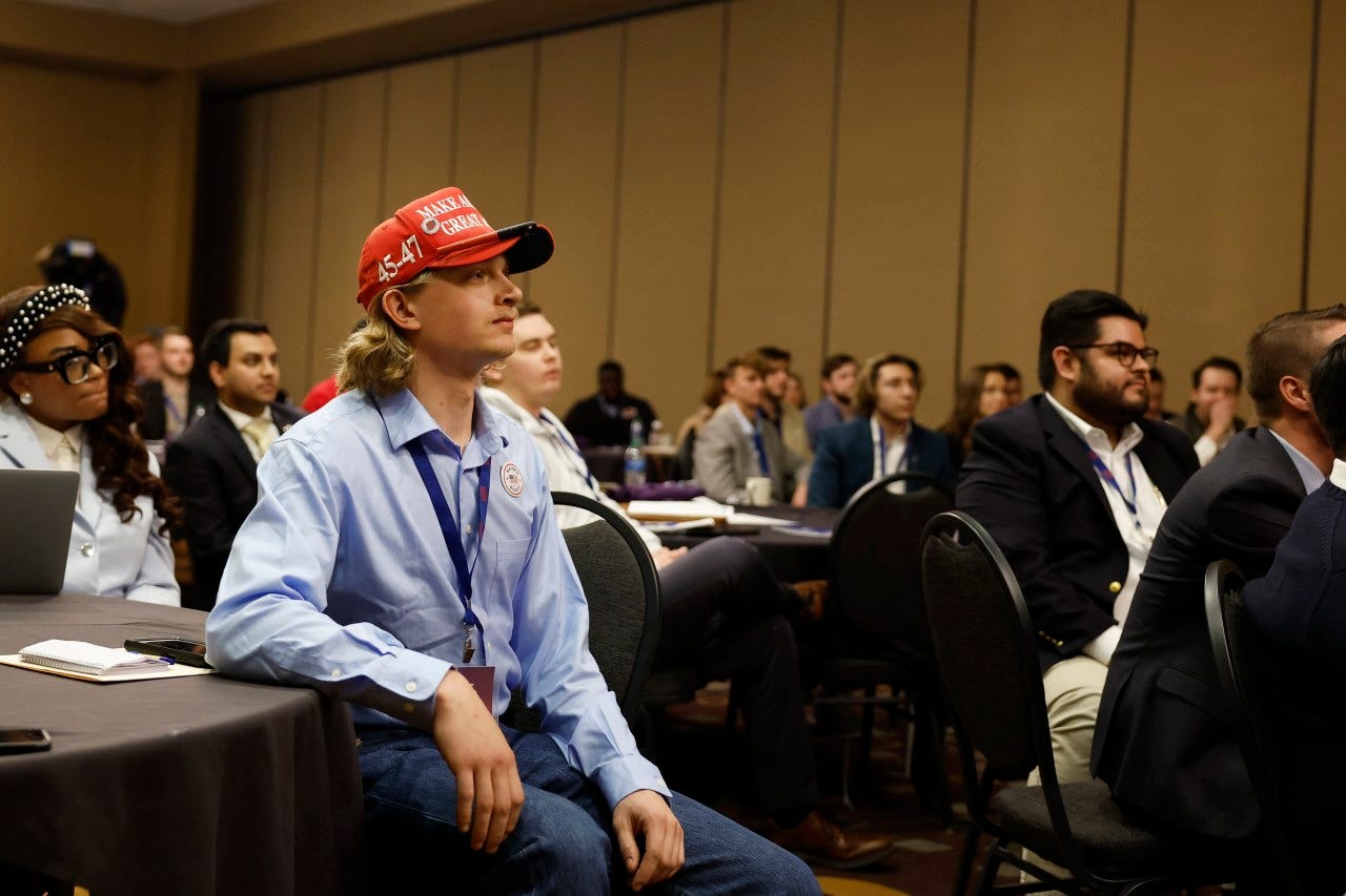 The audience at a Run Gen Z meeting listens to Donald Trump speak in Des Moines, Iowa, on Jan. 06, 2024 The audience at a Run Gen Z meeting listens to Donald Trump speak in Des Moines, Iowa, on Jan. 06, 2024