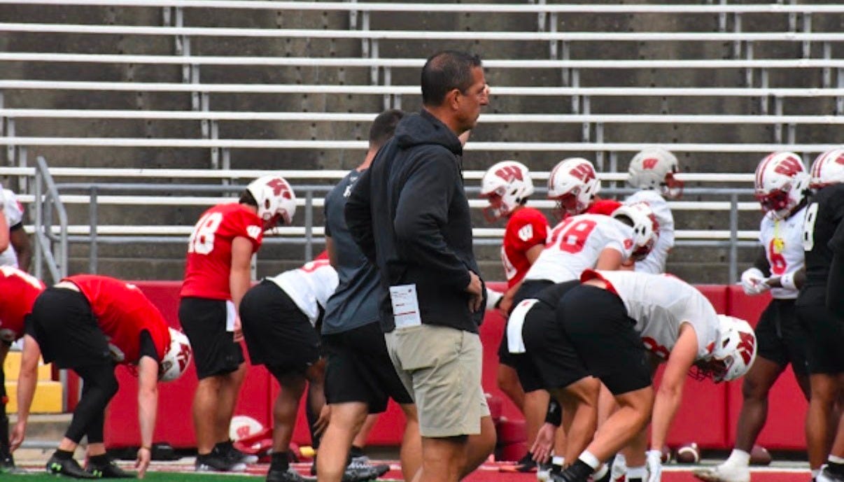 Wisconsin head coach Luke Fickell watches practice during the first day of fall camp at Camp Randall Stadium. Wisconsin head coach Luke Fickell watches practice during the first day of fall camp at Camp Randall Stadium.