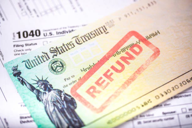 Tax Refund Check A United States treasury check with a tax refund Refund tax stock pictures, royalty-free photos & images Tax Refund Check A United States treasury check with a tax refund Refund tax stock pictures, royalty-free photos & images