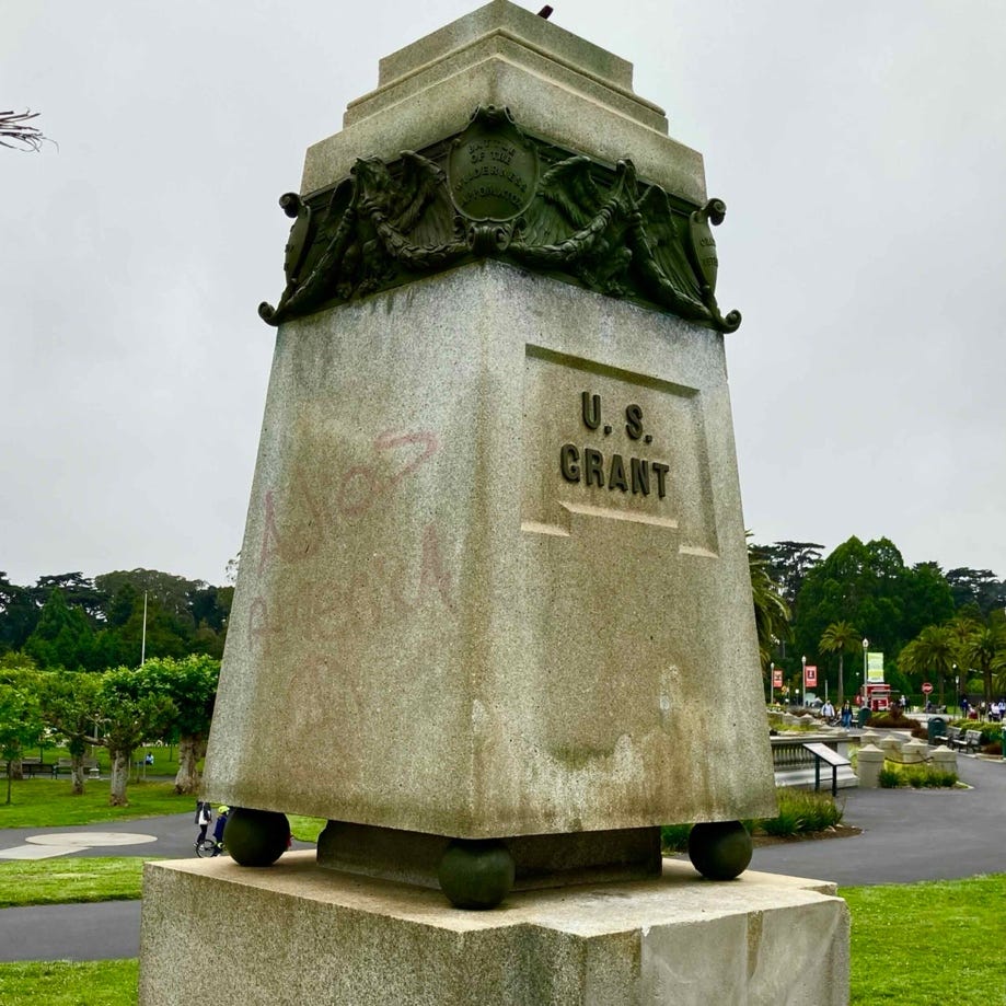 A monument in a park

AI-generated content may be incorrect.