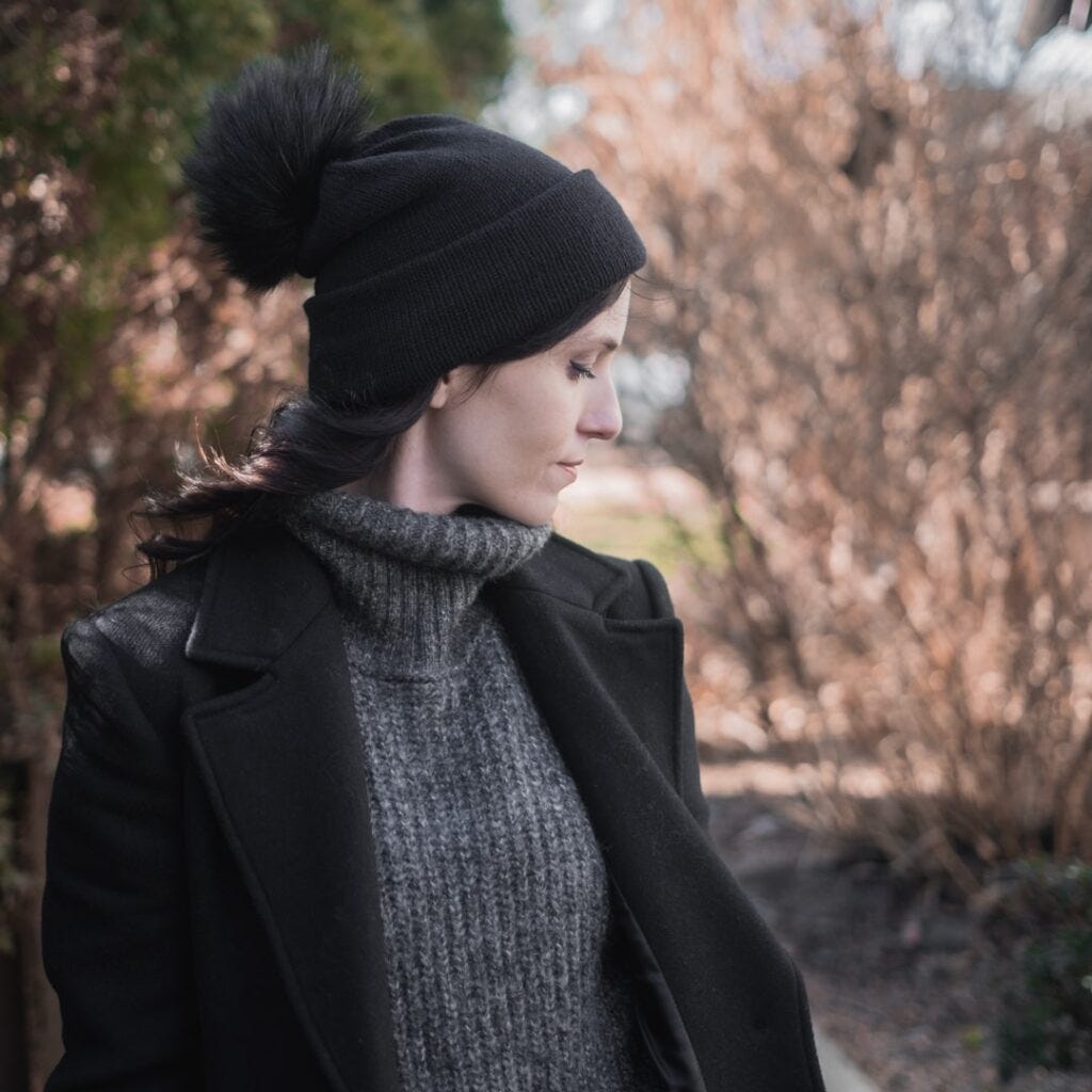 Kristin Lehrer's handknit Oslo Hat in black, a PetiteKnit pattern, knitted using Ella Rae Cashmereno Sport Kristin Lehrer's handknit Oslo Hat in black, a PetiteKnit pattern, knitted using Ella Rae Cashmereno Sport